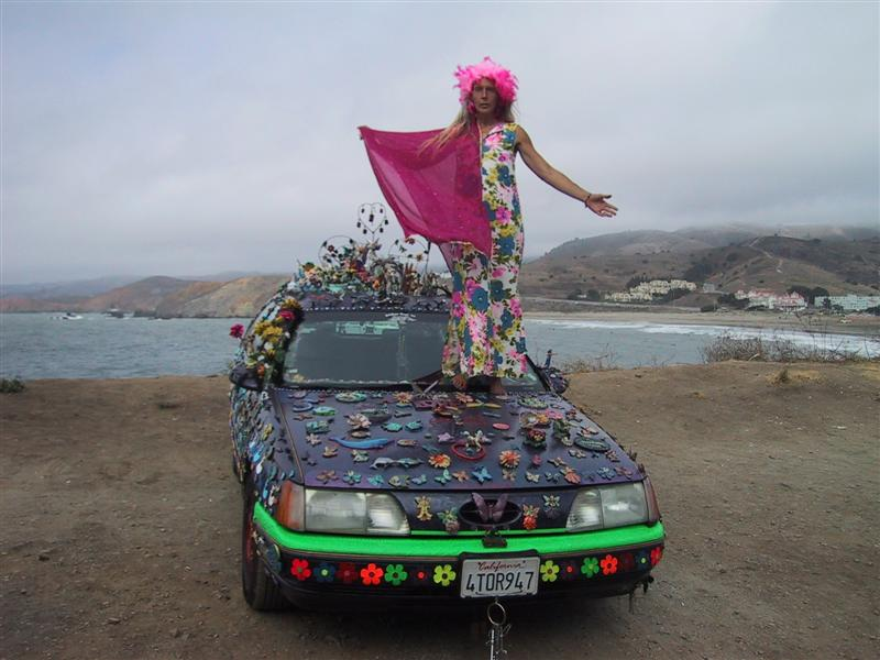 Illustration for article titled Groovalicious Purple Princess Of Peace Art Car Falls On Hard Times, Faces Crusher